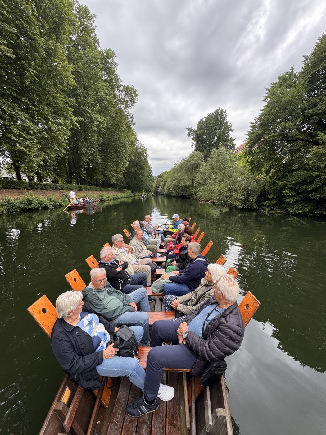Punting trip with friends through the green Neckar canal in Tübingen